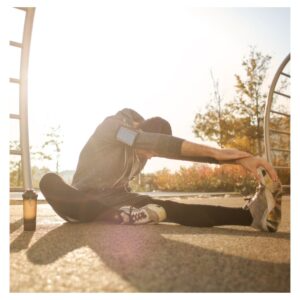 a man stretching outside