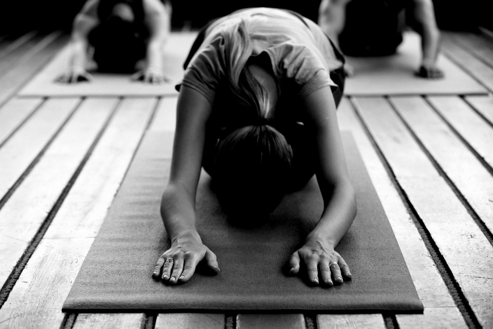 Woman in yoga dog pose